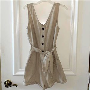 Beige shorts romper with belt included